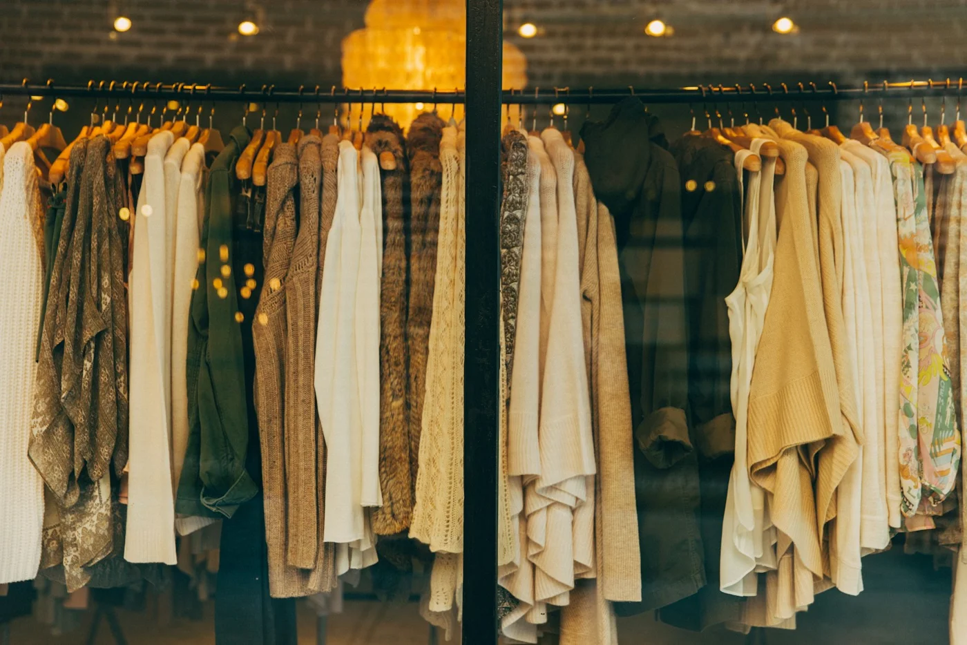 Clothes arranged on a wardrobe rail